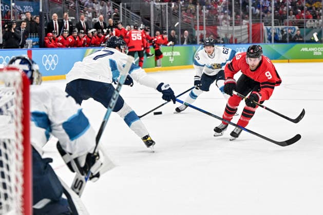 MILAN, ITALY - FEBRUARY 20: Sam Bennett of Canada R) takes a shot against goalkeeper Juuse Saros of Finland during the Ice hockey, Eishockey Men™s Play-offs Semifinals match between Canada and Finland on day fourteen of the Milano Cortina 2026 Winter Olympic Games, Olympische Spiele, Olympia, OS at Milano Santagiulia Ice Hockey Arena on February 20, 2026 in Milan, Italy. Milan Milano Santagiulia Ice Hockey Arena Italy *** MILAN, ITALY FEBRUARY 20 Sam Bennett of Canada R takes a shot against goalkeeper Juuse Saros of Finland during the Ice Hockey Men™s Play offs Semifinals match between Canada and Finland on day fourteen of the Milano Cortina 2026 Winter Olympic games at Milano Santagiulia Ice Hockey Arena on February 20, 2026 in Milan, Italy Milan Milano Santagiulia Ice Hockey Arena Italy Copyright: xJustPictures.ch AndreaxBrancax jp-en-EuSpIm-AB-AAB_318620022026