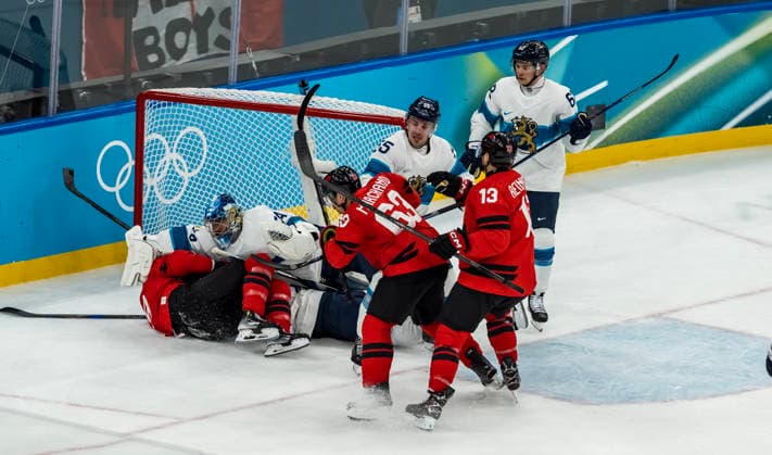 February 20, 2026, Milan, Lombardy, Italy: Team Canada fights against Team Finland during the 1st period in the Mens Play-offs Semifinal game at the Milano Santagiulia Ice hockey, Eishockey Arena in MILAN, Italy during the 2026 Milano Cortina Winter Olympics. Olympics 2026: Milano Cortina: Ice Hockey Mens: Team Canada Vs Team Finland Play-Offs Semifinals  - ZUMAa161 20260220_oly_a161_007 Copyright: xWalterxG.xArcex