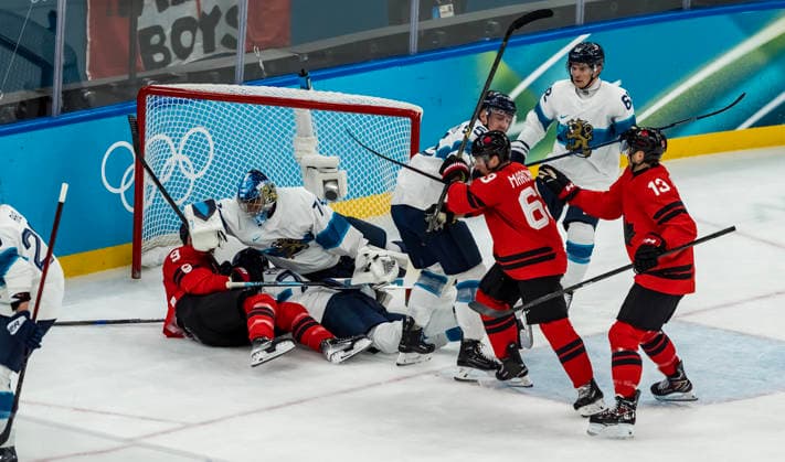 February 20, 2026, Milan, Lombardy, Italy: Team Canada fights against Team Finland during the 1st period in the Mens Play-offs Semifinal game at the Milano Santagiulia Ice hockey, Eishockey Arena in MILAN, Italy during the 2026 Milano Cortina Winter Olympics. Olympics 2026: Milano Cortina: Ice Hockey Mens: Team Canada Vs Team Finland Play-Offs Semifinals  - ZUMAa161 20260220_oly_a161_008 Copyright: xWalterxG.xArcex