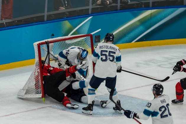 February 20, 2026, Milan, Lombardy, Italy: Forward Sam Bennett 9 of Team Canada interferes with Team Finland Goalkeeper Juuse Saros 74 of Team Finland during the 1st period in the Mens Play-offs Semifinal game at the Milano Santagiulia Ice hockey, Eishockey Arena in MILAN, Italy during the 2026 Milano Cortina Winter Olympics. Olympics 2026: Milano Cortina: Ice Hockey Mens: Team Canada Vs Team Finland Play-Offs Semifinals  - ZUMAa161 20260220_oly_a161_011 Copyright: xWalterxG.xArcex