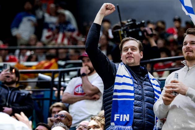 OLYMPICS - Winter Olympic Games, Olympische Spiele, Olympia, OS Milano Cortina 2026 MILAN,ITALY,20.FEB.26 - OLYMPICS, Ice hockey, Eishockey - Winter Olympic Games Milano Cortina 2026, semifinal, Canada vs Finland, men. Image shows the rejoicing of a fan of Finland.  GEPAxpictures xMatthiasxTrinkl