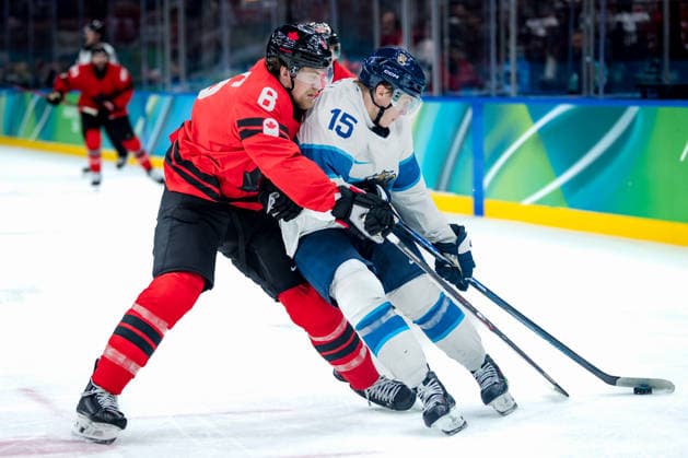 OLYMPICS - Winter Olympic Games, Olympische Spiele, Olympia, OS Milano Cortina 2026 MILAN,ITALY,20.FEB.26 - OLYMPICS, Ice hockey, Eishockey - Winter Olympic Games Milano Cortina 2026, semifinal, Canada vs Finland, men. Image shows Travis Sanheim (CAN) and Anton Lundell (FIN).  GEPAxpictures xMatthiasxTrinkl