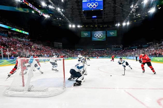 MILAN, ITALY - FEBRUARY 20: Travis Sanheim of Canada R) takes a shot against goalkeeper Juuse Saros of Finland L) during the Ice hockey, Eishockey Men™s Play-offs Semifinals match between Canada and Finland on day fourteen of the Milano Cortina 2026 Winter Olympic Games, Olympische Spiele, Olympia, OS at Milano Santagiulia Ice Hockey Arena on February 20, 2026 in Milan, Italy. Milan Milano Santagiulia Ice Hockey Arena Italy *** MILAN, ITALY FEBRUARY 20 Travis Sanheim of Canada R takes a shot against goalkeeper Juuse Saros of Finland L during the Ice Hockey Men™s Play offs Semifinals match between Canada and Finland on day fourteen of the Milano Cortina 2026 Winter Olympic games at Milano Santagiulia Ice Hockey Arena on February 20, 2026 in Milan, Italy Milan Milano Santagiulia Ice Hockey Arena Italy Copyright: xJustPictures.ch AndreaxBrancax jp-en-EuSpIm-AB-DSC_147820022026