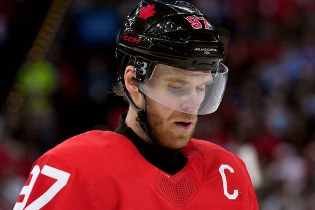 February 20, 2026, Milan, ITALY: Canada forward Connor McDavid (97) looks on during second period Men s Olympic semifinal Ice hockey, Eishockey action at the 2026 Milan Cortina Winter Olympics in Milan, Friday, Feb. 20, 2026. Canada News - February 20, 2026  - ZUMAc35_ 20260220_zaf_c35_052 Copyright: xNathanxDenettex