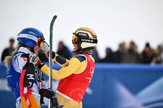 (260220) -- LIVIGNO, Feb. 20, 2026 -- Daniela Maier (R) of Germany hugs Fanny Smith of Switzerland after the big final of the freestyle skiing women s ski cross event at the Milan-Cortina 2026 Olympic Winter games, Winterspiele,Spiele, Summer games in Livigno, Italy, Feb. 20, 2026. ) (MICO2026)ITALY-LIVIGNO-OLYMPIC WINTER GAMES-FREESTYLE SKIING-WOMEN S SKI CROSS ZhangxHongxiang 