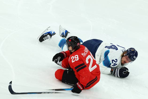 February 20, 2026, Milan, Lombardy, Italy: NATHAN MACKINNON of Canada and ROOPE HINTZ of Finland bump into each other during the Semifinal game between Team Canada (CAN) and Team Finland (FIN) at the Milano Cortina 2026 Olympic Games, Olympische Spiele, Olympia, OS Olympics 2026: Milano Cortina: Ice hockey, Eishockey Men: CAN:FIN  - ZUMAc179 20260220_oly_c179_060 Copyright: xMickaelxChavetx