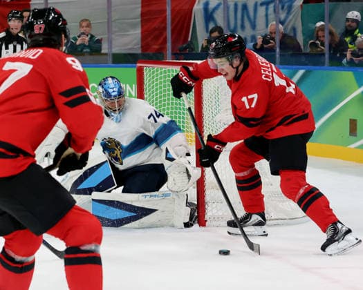 February 20, 2026, Milan, Lombardy, Italy: Macklin Celebrini (17) of Team Canada and Juuse Saros (74) of Team Finland in a men s Ice hockey, Eishockey semifinal during the Milano Cortina 2026 Olympic Winter games, Winterspiele,Spiele, Summer games at Milano Santagiulia Ice Hockey Arena Olympics 2026: Milano Cortina: Ice Hockey-Men Semifinal- CAN-FIN  - ZUMAm117 20260220_oly_m117_023 Copyright: xDavidxMcIntyrex