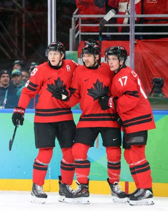 February 20, 2026, Milan, Lombardy, Italy: Sam Reinhart (13) of Team Canada after goal against Team Finland with Nathan MacKinnon (29) of Team Canada and Macklin Celebrini (17) of Team Canada in a men s Ice hockey, Eishockey semifinal during the Milano Cortina 2026 Olympic Winter games, Winterspiele,Spiele, Summer games at Milano Santagiulia Ice Hockey Arena Olympics 2026: Milano Cortina: Ice Hockey-Men Semifinal- CAN-FIN  - ZUMAm117 20260220_oly_m117_024 Copyright: xDavidxMcIntyrex
