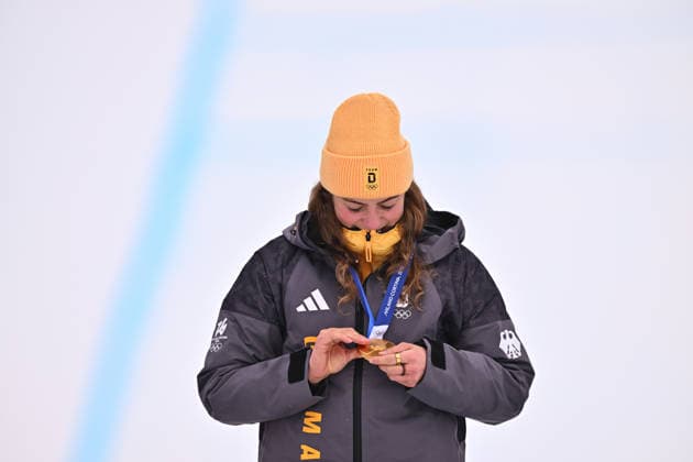 (260220) -- LIVIGNO, Feb. 20, 2026 -- Gold medalist Daniela Maier of Germany looks at her medal during the awarding ceremony of the freestyle skiing women s ski cross event at the Milan-Cortina 2026 Olympic Winter games, Winterspiele,Spiele, Summer games in Livigno, Italy, Feb. 20, 2026. ) (MICO2026)ITALY-LIVIGNO-OLYMPIC WINTER GAMES-FREESTYLE SKIING-WOMEN S SKI CROSS ZhangxHongxiang 