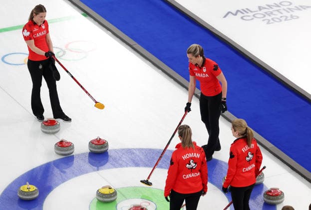 (260220) -- CORTINA D AMPEZZO, Feb. 20, 2026 -- Players of Canada have a discussion during the curling women s semifinal match between Canada and Sweden at the 2026 Milan-Cortina Winter Olympics in Cortina, Italy, Feb. 20, 2026. ) (MICO2026)ITALY-CORTINA D AMPEZZO-OLYMPIC Winter games, Winterspiele,Spiele, Summer games CURLING-WOMEN-SEMIFINAL-CAN VS SWE ZhangxChenlin 