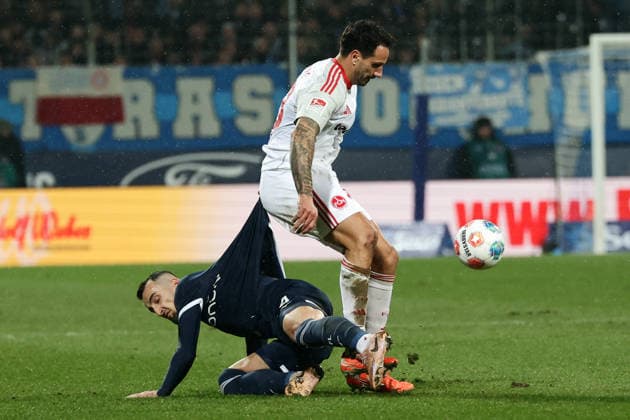 Bochum, Germany, 20.02.26, Erhan Masovic (VfL Bochum) und Adriano Grimaldi (1.FC Nuernberg) im Zweikampf während des Spiels der 2. Bundesliga zwischen VfL 1848 Bochum - 1. FC Nuernberg im Vonovia Ruhrstadion in Bochum. (Photo by Joachim Bywaletz) DFB DFL REGULATIONS PROHIBIT ANY USE OF PHOTOGRAPHS AS IMAGE SEQUENCES AND OR QUASI-VIDEO.