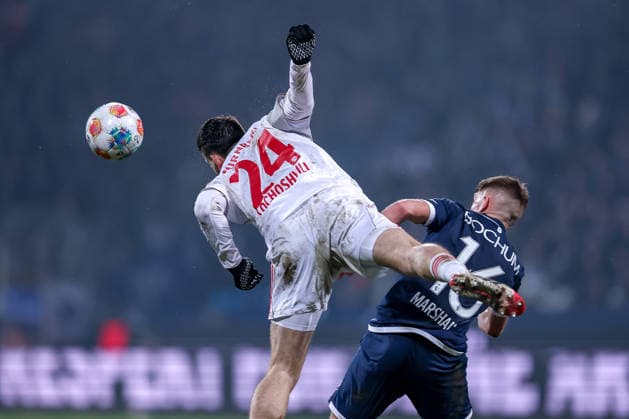 20.02.2026, Fußball, VfL Bochum - 1. FC Nürnberg, 2. Fußball Bundesliga, 23. Spieltag, Vonovia Ruhrstadion, Saison 2025 2026: Luka Lochoshvili (1FC Nuernberg 24) im Zweikampf gegen Callum Marshall (VfL Bochum 16) DFB regulations prohibit any use of photographs as image sequences and or quasi-video. Nordrhein-Westfalen Deutschland