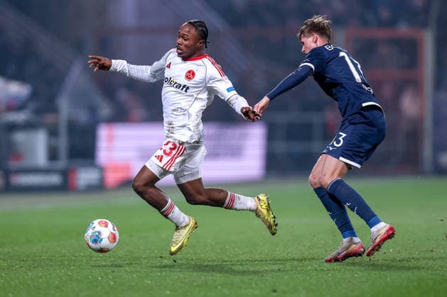 20.02.2026, Fußball, VfL Bochum - 1. FC Nürnberg, 2. Fußball Bundesliga, 23. Spieltag, Vonovia Ruhrstadion, Saison 2025 2026: Mohamed AlÃ¬ Zoma (1FC Nuernberg 23) im Zweikampf gegen Oliver Olsen (VfL Bochum 13) DFB regulations prohibit any use of photographs as image sequences and or quasi-video. Nordrhein-Westfalen Deutschland