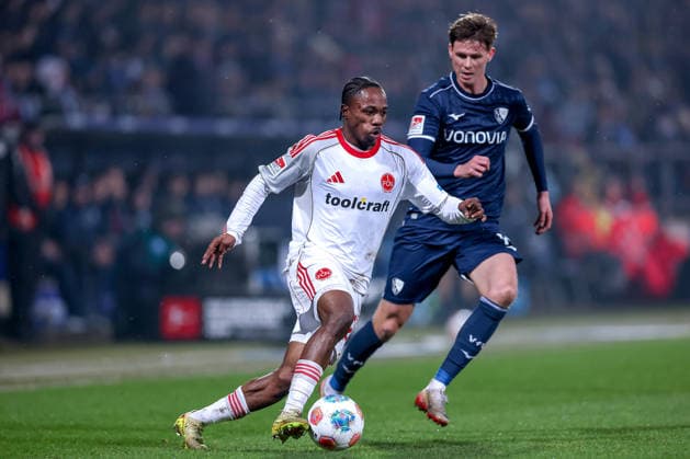 20.02.2026, Fußball, VfL Bochum - 1. FC Nürnberg, 2. Fußball Bundesliga, 23. Spieltag, Vonovia Ruhrstadion, Saison 2025 2026: Mohamed AlÃ¬ Zoma (1FC Nuernberg 23) im Zweikampf gegen Oliver Olsen (VfL Bochum 13) DFB regulations prohibit any use of photographs as image sequences and or quasi-video. Nordrhein-Westfalen Deutschland