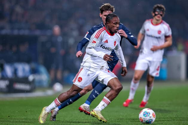 20.02.2026, Fußball, VfL Bochum - 1. FC Nürnberg, 2. Fußball Bundesliga, 23. Spieltag, Vonovia Ruhrstadion, Saison 2025 2026: Mohamed AlÃ¬ Zoma (1FC Nuernberg 23) im Zweikampf gegen Oliver Olsen (VfL Bochum 13) DFB regulations prohibit any use of photographs as image sequences and or quasi-video. Nordrhein-Westfalen Deutschland