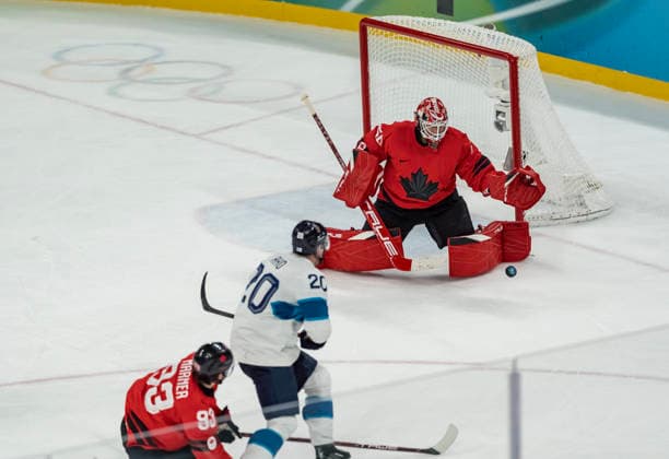 February 20, 2026, Milan, Lombardy, Italy: Goalkeeper Jordan Binnington 50 of Team Canada saves a goal against Team Finland in the Mens Team Canada Vs Team Finland Play-offs Semifinals game at the Milano Santagiulia Ice hockey, Eishockey Arena in MILAN, Italy during the 2026 Milano Cortina Winter Olympics. Team Canada advances to the finals, winning against Team Finland, 3:2 in regulation play. Milan Italy - ZUMAa161 20260220_oly_a161_033 Copyright: xWalterxG.xArcex