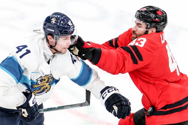 ITALY, MILAN - FEBRUARY 20, 2026: Finland s Miro Heiskanen (L) and Canada s Tom Wilson in a menâ€™s Ice hockey, Eishockey play-off semifinal match at the Milano Santagiulia Ice Hockey Arena, as part of the 2026 Winter Olympic Games, Olympische Spiele, Olympia, OS Peter Kovalev TASS  89005734