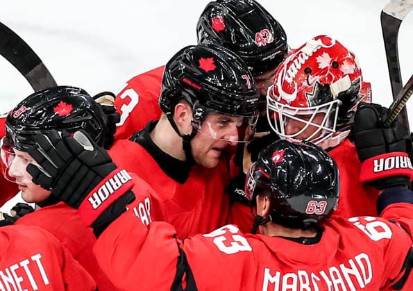 ITALY, MILAN - FEBRUARY 20, 2026: Canada s players celebrate their victory in a menâ€™s Ice hockey, Eishockey play-off semifinal match against Finland at the Milano Santagiulia Ice Hockey Arena, as part of the 2026 Winter Olympic Games, Olympische Spiele, Olympia, OS Peter Kovalev TASS  89006391