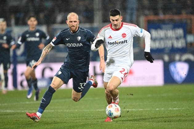 Philipp HOFMANN (BO) gegen Luka LOCHOSHVILI (N) Fussball 2. Bundesliga, 23. Spieltag, matchday 23, VfL Bochum (BO) - 1. FC Nuernberg am 20.02.2026, Vonovia Ruhrstadion Bochum Deutschland. DFL regulations prohibit any use of photographs as image sequences and or quasi-video Ã‚Â