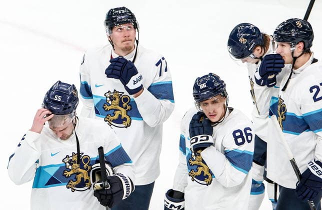 ITALY, MILAN - FEBRUARY 20, 2026: Finland s players are seen after a menâ€™s Ice hockey, Eishockey play-off semifinal match against Canada at the Milano Santagiulia Ice Hockey Arena, as part of the 2026 Winter Olympic Games, Olympische Spiele, Olympia, OS Canada won 3-2. Peter Kovalev TASS  89006392