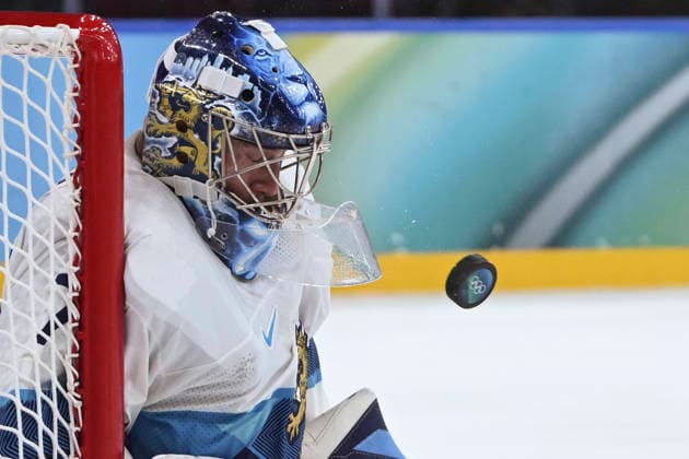 (260220) -- MILAN, Feb. 20, 2026 -- Goalkeeper Juuse Saros of Finland reacts during the Ice hockey, Eishockey men s play-offs quarterfinal between Canada and Finland at the Milan-Cortina 2026 Olympic Winter games, Winterspiele,Spiele, Summer games in Milan, Italy, Feb. 20, 2026. ) (MICO2026)ITALY-MILAN-OLYMPIC WINTER GAMES-ICE HOCKEY-MEN-PLAY-OFFS SEMIFINALS-CAN VS FIN ZhangxHaofu 