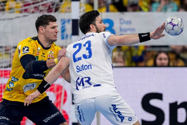 v.li.: Sebastian Heymann (RNL, 13), Tim Suton (TBV, 23), Zweikampf, Spielszene, Duell, duel, tackle, tackling, Dynamik, Action, Aktion, 20.02.2026, Mannheim (Deutschland), Handball, Bundesliga, Rhein-Neckar Löwen - TBV Lemgo Lippe