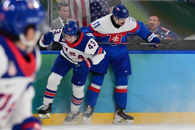 XXV Winter Olympic Games, Olympische Spiele, Olympia, OS in Milan, Italy, on February 20, 2026. Men s Ice hockey, Eishockey semifinal, USA vs Slovakia. From left Quinn Hughes of USA and Milos Kelemen of Slovakia. (CTKxPhoto MichalxKamaryt) CTKPhotoP2026022010452  CTKPhotoP2026022010452