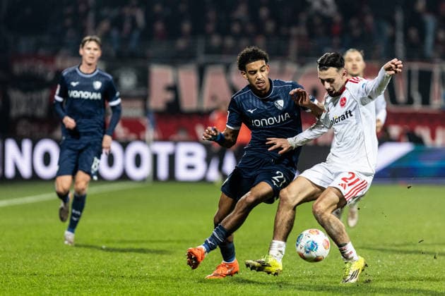 2. Fußball Bundesliga: VfL Bochum - 1. FC Nürnberg; 20.02.2026 Francis Onyeka (VfL Bochum, 21), Berkay Yilmaz (1. FC Nürnberg, 21) 2. Fußball Bundesliga: VfL Bochum - 1. FC Nürnberg; Vonovia-Ruhrstadion, Bochum; 20.02.2026 DFL regulations prohibit any use of photographs as image sequences and or quasi video.