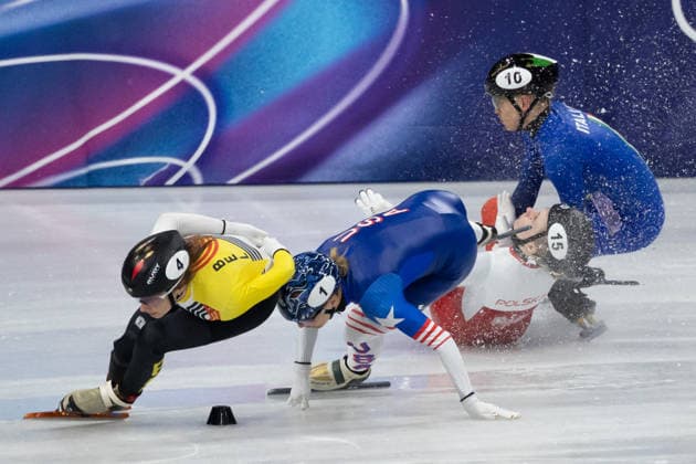 February 20, 2026, Milano, Lombardy, Italy: Kristen Santos-Griswold (1) of the United States, Kamila Sellier (15) of Poland and Arianna Fontana (10) of Italy crash in the Short Track Speed skating, Eisschnelllauf Women 1500m quarterfinals during the 2026 Winter Olympics at the Milano Ice Skating Arena on Friday in Milano. Olympics 2026: Milano Cortina: Short Track Speed Skating Women s  - ZUMAj89_ 20260220_oly_j89_003 Copyright: xPaulxKitagakixJr.x