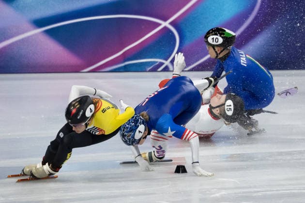 February 20, 2026, Milano, Lombardy, Italy: Kristen Santos-Griswold (1) of the United States, Kamila Sellier (15) of Poland and Arianna Fontana (10) of Italy crash in the Short Track Speed skating, Eisschnelllauf Women 1500m quarterfinals during the 2026 Winter Olympics at the Milano Ice Skating Arena on Friday in Milano. Olympics 2026: Milano Cortina: Short Track Speed Skating Women s  - ZUMAj89_ 20260220_oly_j89_006 Copyright: xPaulxKitagakixJr.x
