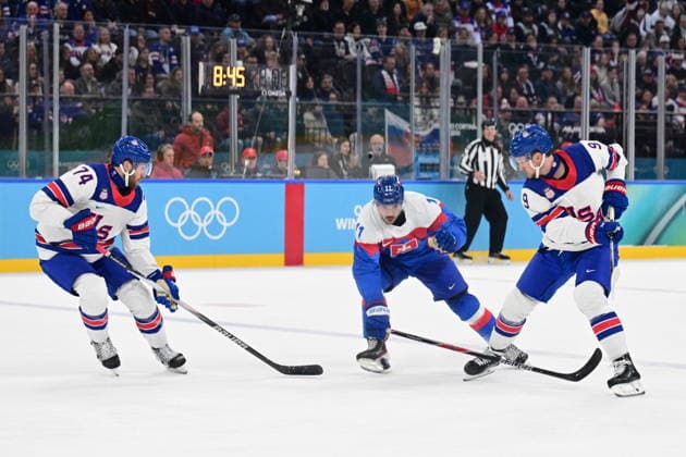 XXV Winter Olympic Games, Olympische Spiele, Olympia, OS in Milan, Italy, on February 20, 2026. Men s Ice hockey, Eishockey semifinal, USA vs Slovakia. From left Jaccob Slavin of USA, Milos Kelemen of Slovakia and Jack Eichel of USA. (CTKxPhoto MichalxKamaryt) CTKPhotoP2026022010652  CTKPhotoP2026022010652