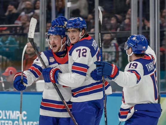 United States Jack Eichel (9) and United States Matthew Tkachuk (19) celebrate after United States Tage Thompson (72) scored a goal in the first period of the Men s Hockey Play-off Semifinal game between Slovakia and the USA at the Milano Santagiulia Ice hockey, Eishockey Arena in Milan, Italy, on Friday, February 20, 2026.  OLY20260220320 AARONxJOSEFCZYK