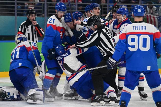 XXV Winter Olympic Games, Olympische Spiele, Olympia, OS in Milan, Italy, on February 20, 2026. Men s Ice hockey, Eishockey semifinal, USA vs Slovakia. From left goalkeeper Samuel Hlavaj of Slovakia, Brady Tkachuk of USA, Adam Ruzicka, Martin Fehervary and Tomas Tatar of Slovakia. (CTKxPhoto MichalxKamaryt) CTKPhotoP2026022010996  CTKPhotoP2026022010996