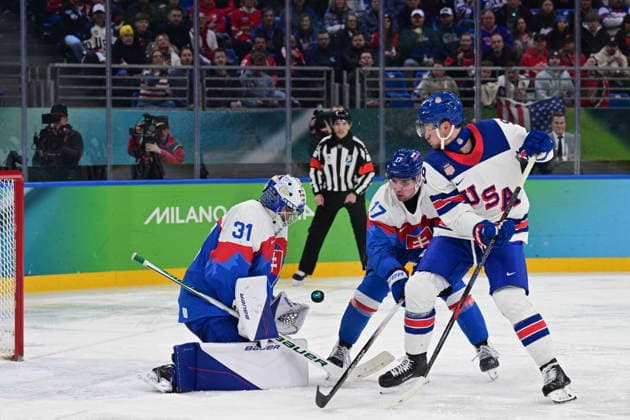 XXV Winter Olympic Games, Olympische Spiele, Olympia, OS in Milan, Italy, on February 20, 2026. Men s Ice hockey, Eishockey semifinal, USA vs Slovakia. From left goalkeeper Samuel Hlavaj of Slovakia, Simon Nemec of Slovakia and Jack Eichel of USA. (CTKxPhoto MichalxKamaryt) CTKPhotoP2026022011016  CTKPhotoP2026022011016