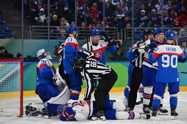 XXV Winter Olympic Games, Olympische Spiele, Olympia, OS in Milan, Italy, on February 20, 2026. Men s Ice hockey, Eishockey semifinal, USA vs Slovakia. From left goalkeeper Samuel Hlavaj of Slovakia, Brady Tkachuk of USA, Adam Ruzicka, Martin Fehervary and Tomas Tatar of Slovakia. (CTKxPhoto MichalxKamaryt) CTKPhotoP2026022011022  CTKPhotoP2026022011022