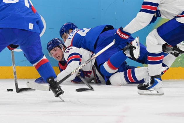 XXV Winter Olympic Games, Olympische Spiele, Olympia, OS in Milan, Italy, on February 20, 2026. Men s Ice hockey, Eishockey semifinal, USA vs Slovakia. From left Matt Boldy of USA and Martin Fehervary of Slovakia. (CTKxPhoto MichalxKamaryt) CTKPhotoP2026022011104  CTKPhotoP2026022011104