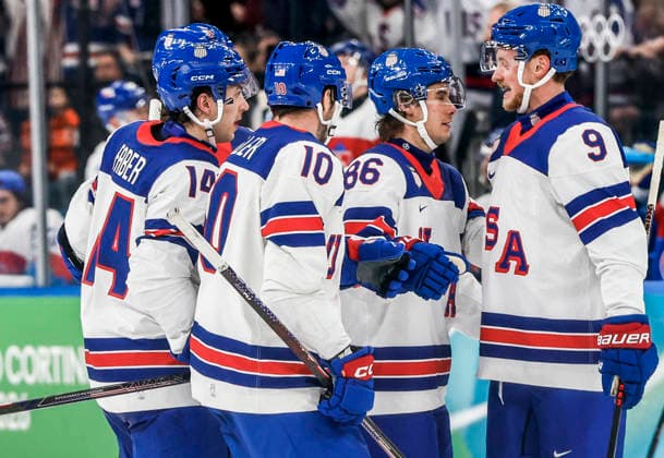 United States Jack Hughes (86) celebrates with teammates after scoring in the second period of the Men s Hockey Play-off Semifinal game between Slovakia and the USA at the Milano Santagiulia Ice hockey, Eishockey Arena in Milan, Italy, on Friday, February 20, 2026.  OLY20260220327 AARONxJOSEFCZYK