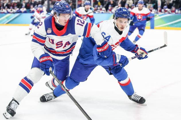 ITALY, MILAN - FEBRUARY 20, 2026: United States Matt Boldy (L) and Slovakia s Patrik Koch are in action in their men™s Ice hockey, Eishockey play-off semifinal match at the Milano Santagiulia Ice Hockey Arena, as part of the 2026 Winter Olympic Games, Olympische Spiele, Olympia, OS 2026 Winter Olympics: Men s Semi-Final Ice Hockey Match, USA - Slovakia  - ZUMAt113 20260220_zaa_t113_349 Copyright: xPeterxKovalevx