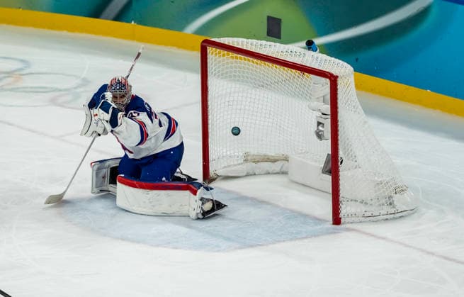 February 20, 2026, Milan, Lombardy, Italy: Connor Hellebuyck 37 of Team United States lets the puck by as Pavol Regenda 84 of Team Slovakia scores a goal against Team USA in the Mens Team USA Vs Team Slovakia Play-offs Semifinals game at the Milano Santagiulia Ice hockey, Eishockey Arena in MILAN, Italy during the 2026 Milano Cortina Winter Olympics. Milan Italy - ZUMAa161 20260220_oly_a161_077 Copyright: xWalterxG.xArcex