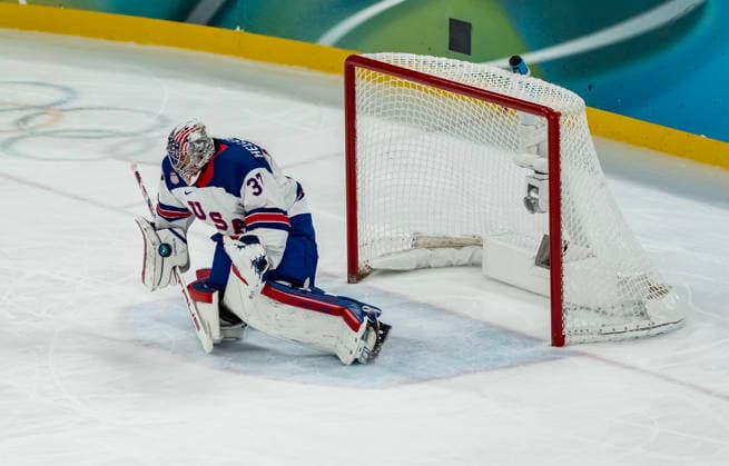 February 20, 2026, Milan, Lombardy, Italy: Connor Hellebuyck 37 of Team United States lets the puck by as Pavol Regenda 84 of Team Slovakia scores a goal against Team USA in the Mens Team USA Vs Team Slovakia Play-offs Semifinals game at the Milano Santagiulia Ice hockey, Eishockey Arena in MILAN, Italy during the 2026 Milano Cortina Winter Olympics. Olympics 2026: Milano Cortina: Ice Hockey Mens: Pavol Regenda  - ZUMAa161 20260220_oly_a161_080 Copyright: xWalterxG.xArcex