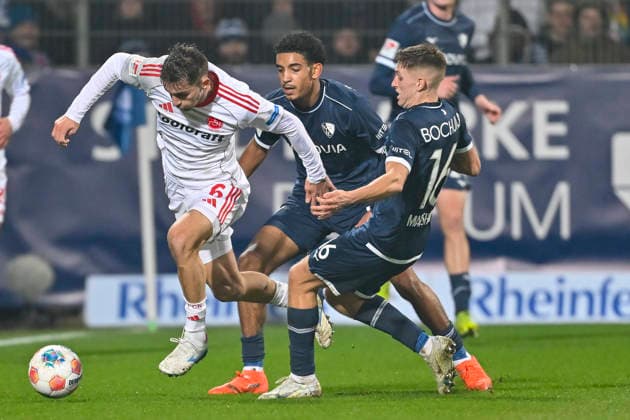 v. li. im Kampf um den Ball Adam Markhiev (Nuernberg 6) Francis Onyeka (Bochum 21) Callum Marshall (Bochum 16) 20.02.2026 Fussball VfL Bochum vs 1. FC Nuernberg, Vonovia Ruhrstadion, Bochum, DFB DFL REGULATIONS PROHIBIT ANY USE OF PHOTOGRAPHS AS IMAGE SEQUENCES AND OR QUASI-VIDEO
