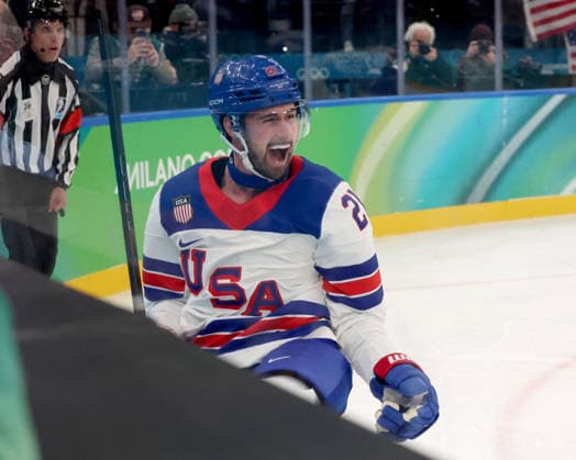 February 20, 2026, Milan, Lombardy, Italy: Dylan Larkin (21) of Team United States scores past Samuel Hlavaj (31) of Team Slovakia in a men s Ice hockey, Eishockey semifinal during the Milano Cortina 2026 Olympic Winter games, Winterspiele,Spiele, Summer games at Milano Santagiulia Ice Hockey Arena. Olympics 2026: Milano Cortina: Ice Hockey-Men Semifinal- USA-SVK  - ZUMAm117 20260220_oly_m117_052 Copyright: xDavidxMcIntyrex