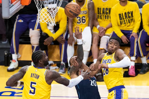 February 20, 2026, Los Angeles, California, USA: Los Angeles Clippers John Collins (20) goes to the basket under pressure from Los Angeles LakersÃ¢â‚¬â ¢ Rui Hachimura (28) during an NBA, Basketball Herren, USA basketball game at Crypto.com Arena on Friday, Feb. 20, 2026 in Los Angeles. Los Angeles USA - ZUMAc68_ 20260220_zaf_c68_026 Copyright: xRingoxChiux