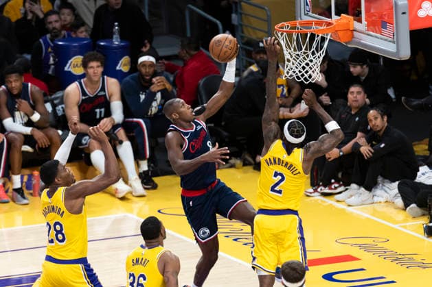 February 20, 2026, Los Angeles, California, USA: Los Angeles Clippers Kris Dunn (8) goes to the basket against Los Angeles LakersÃ¢â‚¬â ¢ Jarred Vanderbilt (2) during an NBA, Basketball Herren, USA basketball game at Crypto.com Arena on Friday, Feb. 20, 2026 in Los Angeles. Los Angeles USA - ZUMAc68_ 20260220_zaf_c68_038 Copyright: xRingoxChiux