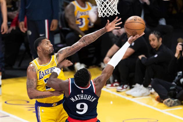 February 20, 2026, Los Angeles, California, USA: Los Angeles Clippers Benedict Mathurin (9) goes to the basket against Los Angeles LakersÃ¢â‚¬â ¢ Marcus Smart (36) during an NBA, Basketball Herren, USA basketball game at Crypto.com Arena on Friday, Feb. 20, 2026 in Los Angeles. Los Angeles USA - ZUMAc68_ 20260220_zaf_c68_043 Copyright: xRingoxChiux