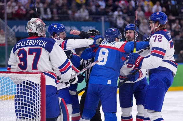 (260221) -- MILAN, Feb. 21, 2026 -- Players of both teams fight during the Ice hockey, Eishockey men s play-offs semifinal match between the United States and Slovakia at the Milan-Cortina 2026 Olympic Winter games, Winterspiele,Spiele, Summer games in Milan, Italy, Feb. 20, 2026. ) (MICO2026)ITALY-MILAN-OLYMPIC WINTER GAMES-ICE HOCKEY-MEN-PLAY-OFFS SEMIFINALS-USA VS SVK TaoxXiyi 