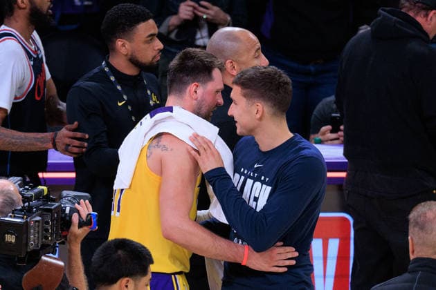 February 20, 2026, Los Angeles, California, USA: Luka Doncic 77 of the Los Angeles Lakers greets Bogdan Bogdanovic 7 of the Los Angeles Clippers after a regular season NBA, Basketball Herren, USA game on Friday February 20, 2026 at Crypto.com Arena in Los Angeles, California. JAVIER ROJAS PI Los Angeles USA - ZUMAp124 20260220_zaa_p124_099 Copyright: xJavierxRojasx