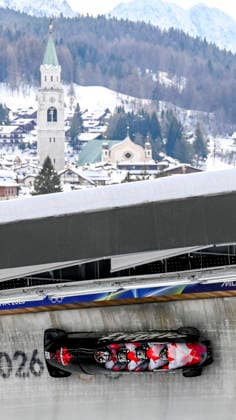 OLYMPICS - Winter Olympic Games, Olympische Spiele, Olympia, OS Milano Cortina 2026 CORTINA D AMPEZZO,ITALY,21.FEB.26 - OLYMPICS, BOBSLEIGH - Winter Olympic Games Milano Cortina 2026, 4-man, heat 1 and 2, men. Image shows Jay Dearborn, Yohan Eskrick-Parkinson, Luka Stoikos and Mark Zanette (CAN).  GEPAxpictures xAlexanderxSolc