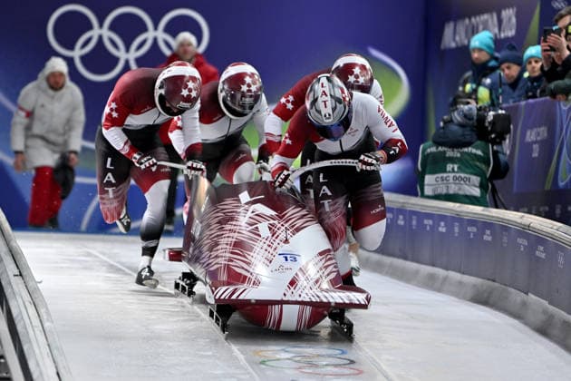 Cortina d Ampezzo, Italy, February 21th 2026. Jekabs Kalenda, Lauris Kaufmanis, Matiss Miknis, Mairis Klava of Latvia in action during the Bobsleight 4-man Heat 1 race of the Olympic Winter games, Winterspiele,Spiele, Summer games 2026 in Cortina d Ampezzo, Italy. (Photo by Igor Kupljenik Sports Press Photo)  Copyright: xIgorxKupljenikx xSPPx Sportspressphoto_SPR95336