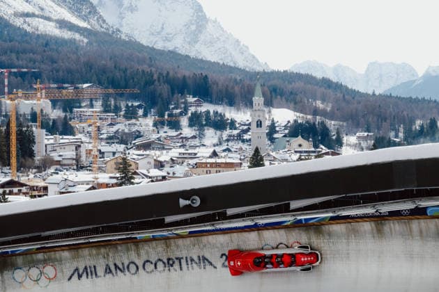 OLYMPICS - Winter Olympic Games, Olympische Spiele, Olympia, OS Milano Cortina 2026 CORTINA D AMPEZZO,ITALY,21.FEB.26 - OLYMPICS, BOBSLEIGH - Winter Olympic Games Milano Cortina 2026, 4-man, heat 1 and 2, men. Image shows Timo Rohner (SUI), Pascal Moser (SUI), Mathieu Hersperger (SUI) and Cyril Bieri (SUI).  GEPAxpictures xAlexanderxSolc